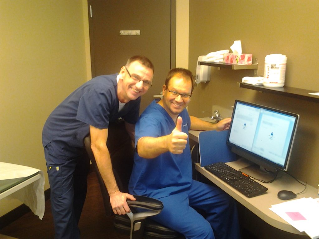 Leonard Laing and Dr. Anthony Bella at the new OUMH Clinic