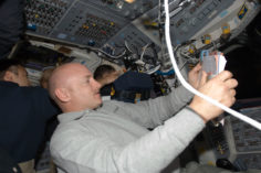 Mark_Kelly_at_work_during_STS-124